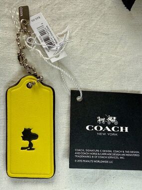 NWT COACH X Peanuts WOODSTOCK Leather Hangtag Key Fob Ring Bag Charm Yellow RARE